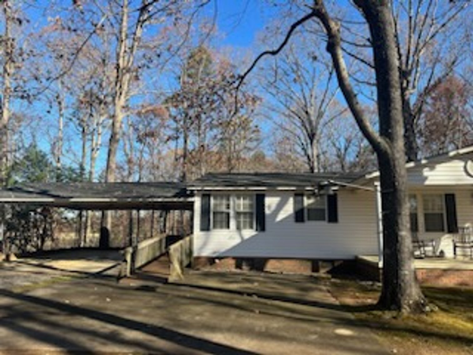 Troutman Home with 2+/- Acres and Multiple Out Buildings Auction