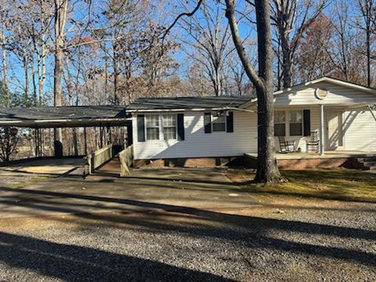 Troutman Home with 2+/- Acres and Multiple Out Buildings Auction