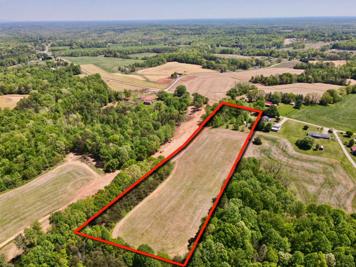 JUDICIAL SALE - 6.96 +/- Beautiful Acres with Outbuildings and Manufactured Home
