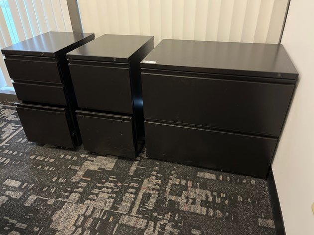 Group of three file cabinets