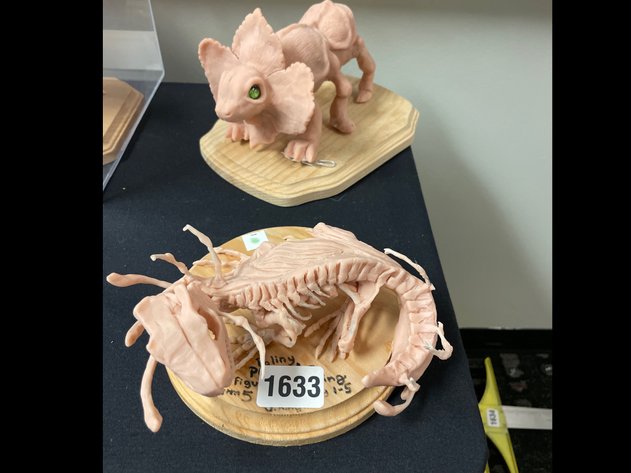 Two clay sculptures