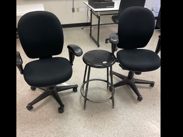 Two office chairs and stool
